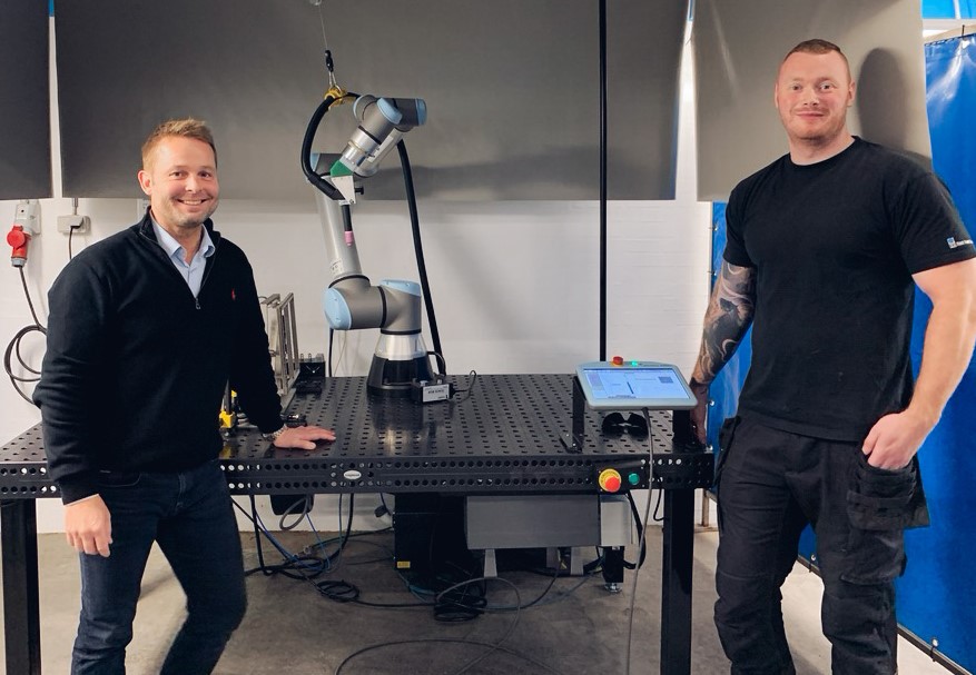 Søren and Mads from FKI Fast Food Teknik with robot welder