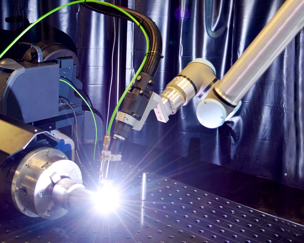 The welding robot RBCobot welding with a TIG-torch The welding robot RBCobot welding with a TIG-torch